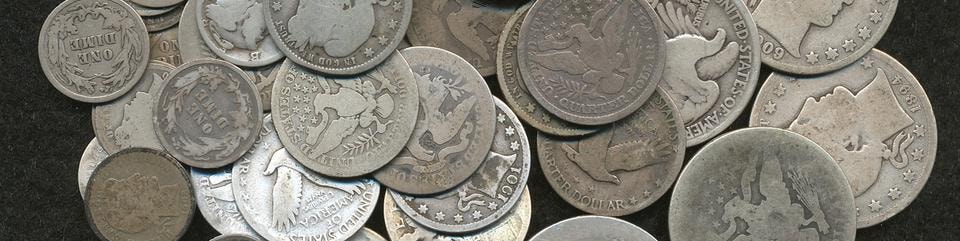 Pile of worn vintage U.S. silver coins
