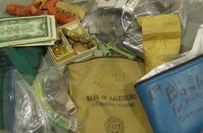 Bank of Galesburg bag with assorted collectibles and currency